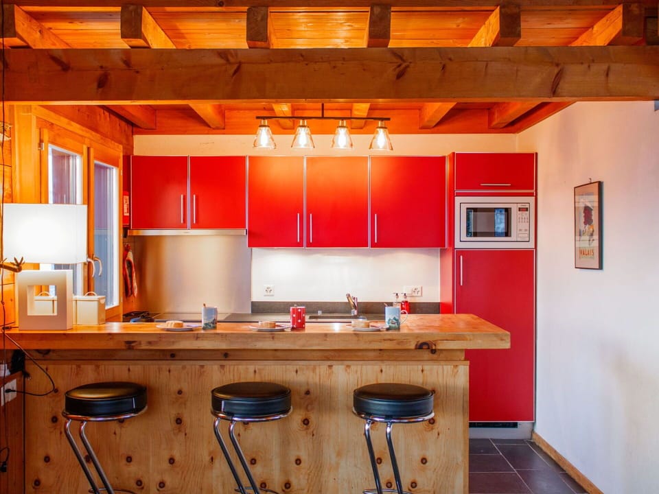 Kitchen, Wood, Furniture, Flooring, Countertop, Interior Design, Ceiling, Bar Stool, Floor, Cabinetry