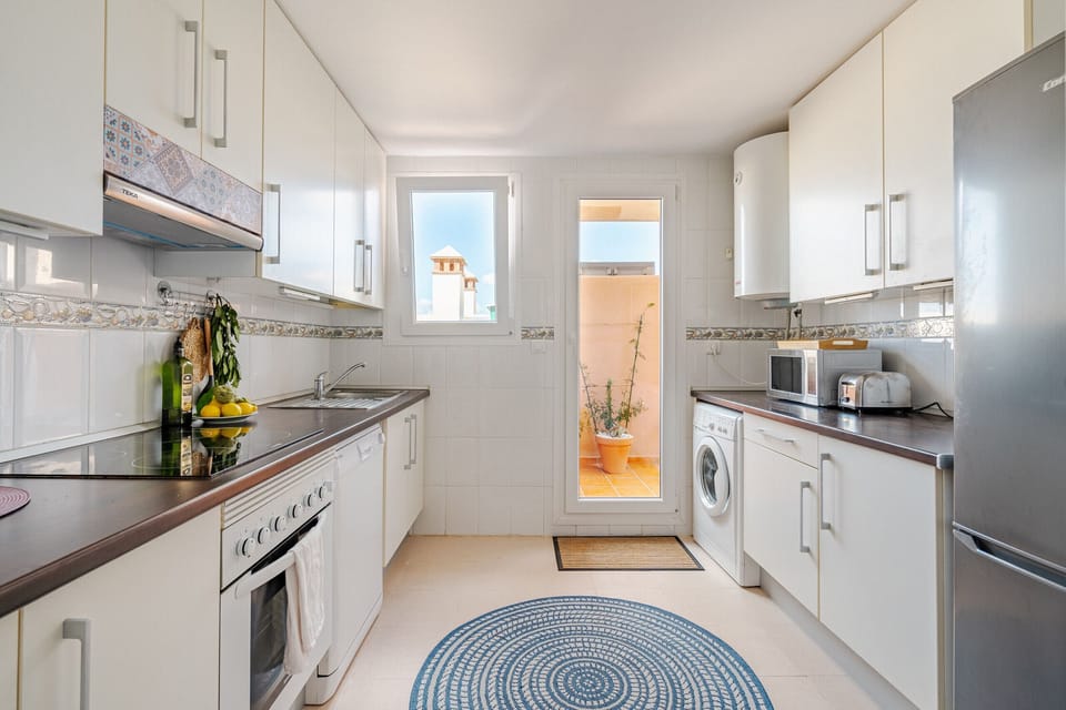 Totally separate kitchen with own balcony. Spacious and fully equipped. Washing and dishwasher. Washing line is available under cover on the private balcony.