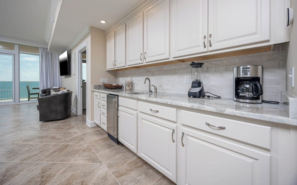 Grab a chilled drink from the fridge or create your favorite cocktail at the wet bar