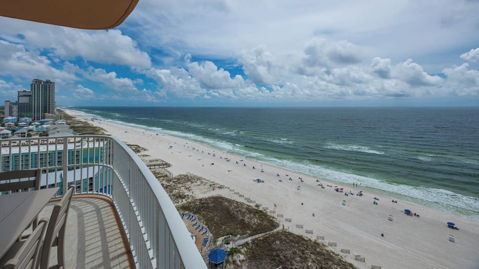 Watch the coastline stretch into the distance and the horizon meet the sky from your corner balcony and soak up the sun