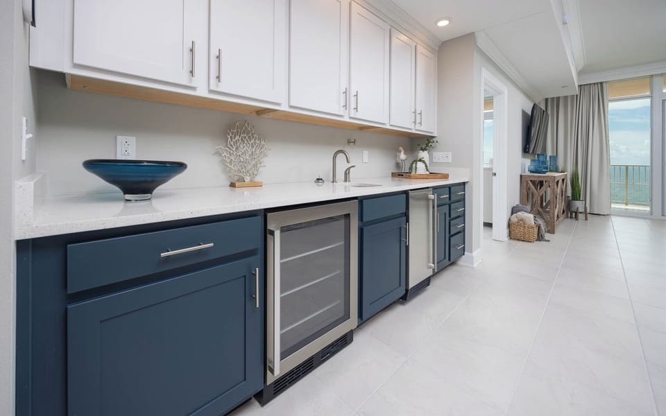 Grab a chilled bottle from the wine cooler or create your favorite cocktail at the wet bar