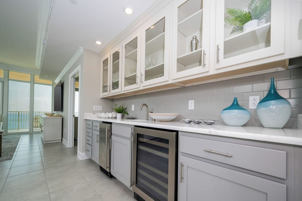 Grab a chilled bottle from the wine cooler or create your favorite cocktail at the wet bar