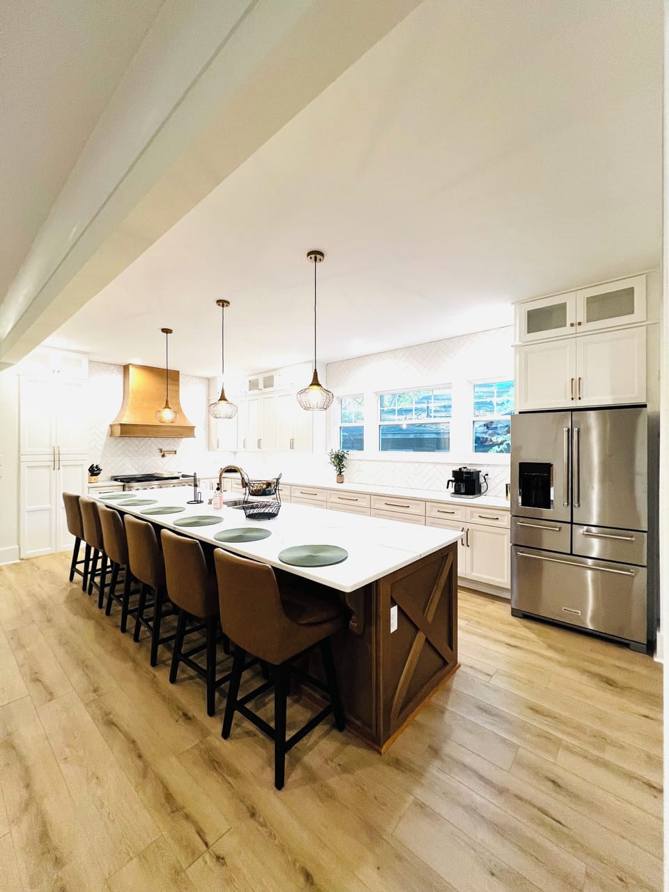 Spacious custom designed kitchen, with luxury appliances and large island.