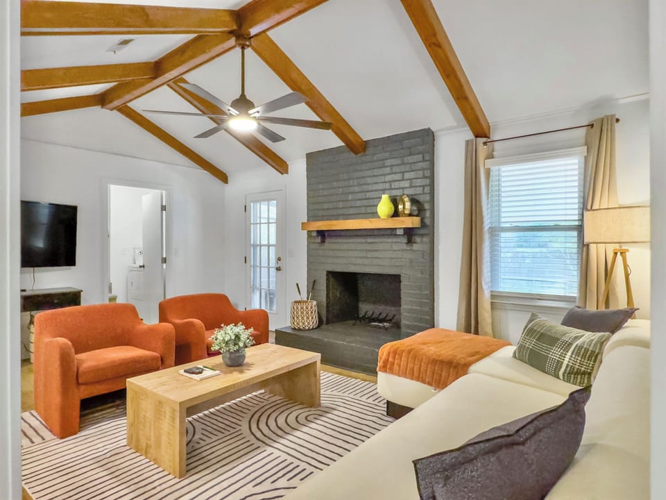 Enter the space through this gorgeous living room with tall ceilings