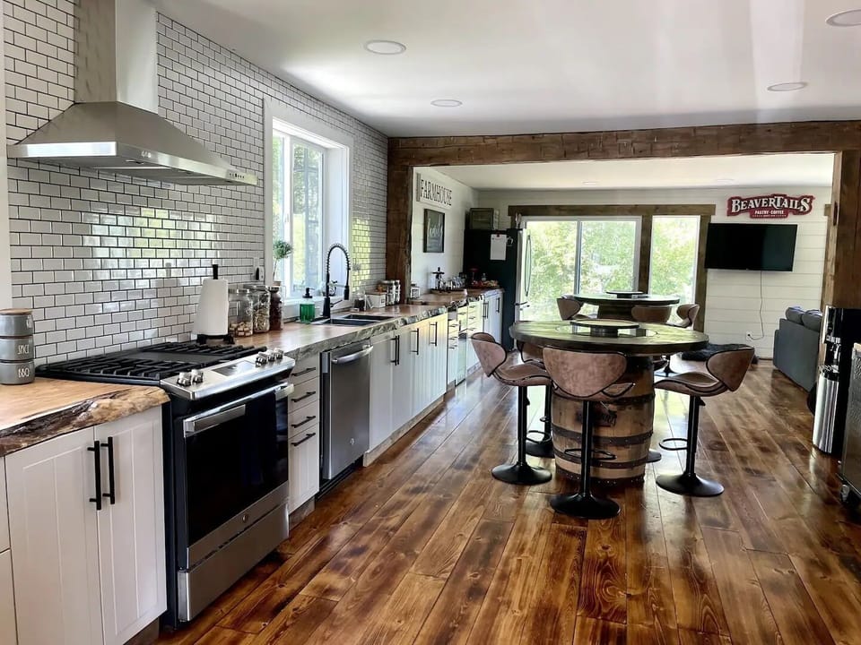 Kitchen with 2 fridges and large entertaining space