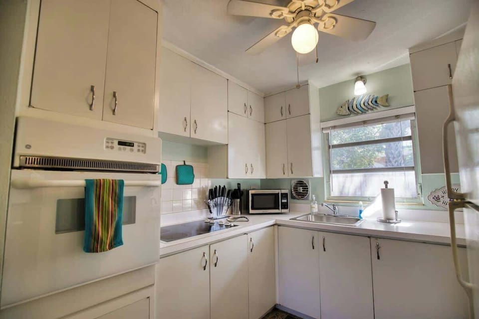 Prepare meals in this bright and airy kitchen.