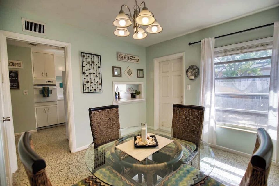 Dine in style in this bright, airy dining room.