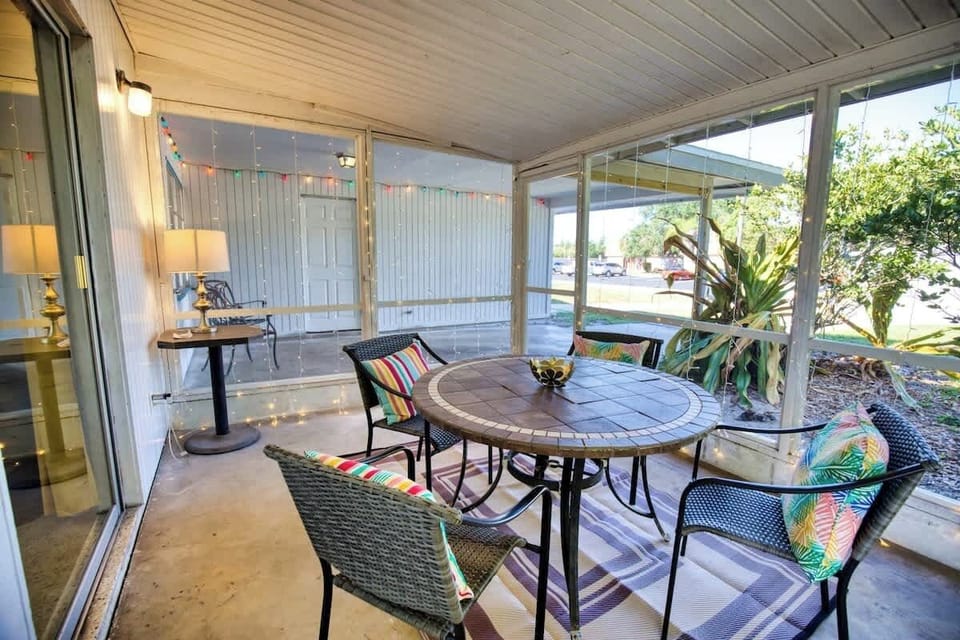 Another view of our relaxing screened porch. Enjoy the breeze!