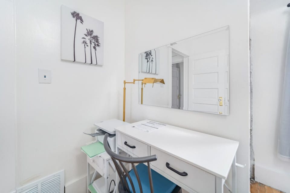 The third bedroom has a small office area