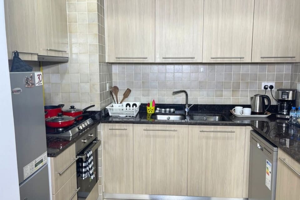 Culinary Haven Where your gastronomic creations come to life in a modern, well-equipped kitchen.