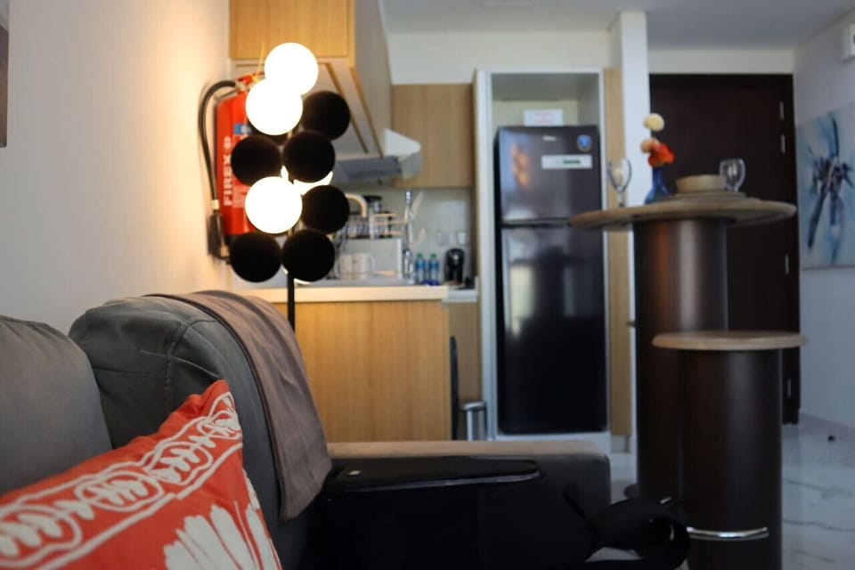 Enjoy a space where sumptuous furnishings meet cozy charm for the perfect living room experience.