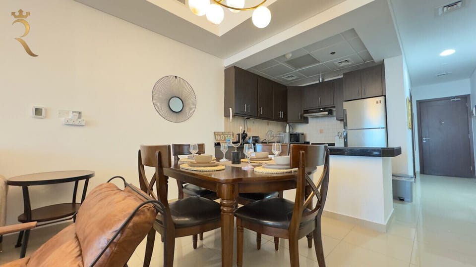 Gather Around: Enjoy meals together at this stylish dining table, perfect for sharing good food and great conversations