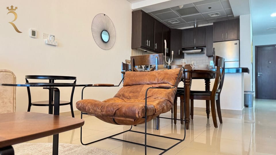 Comfort Meets Style: Relax in this beautifully designed living room, where comfort, style, and natural light come together perfectly.