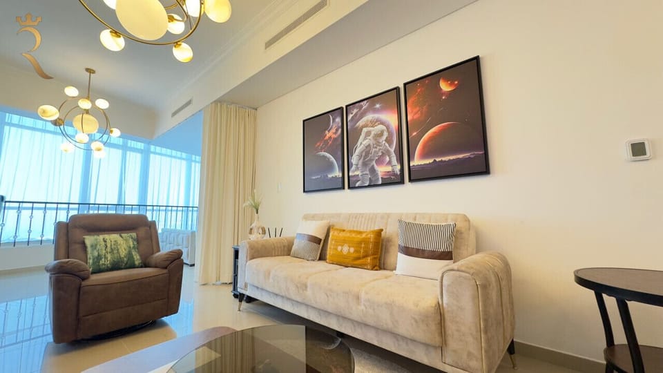 Relax in Style: Cozy up in this spacious living room, designed for comfort and modern elegance. Perfect for unwinding after a day of exploring.