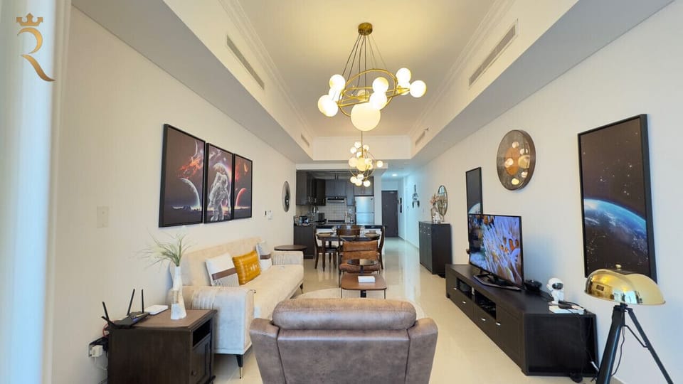 A Warm Welcome Awaits: Relax in this beautifully furnished living room with natural light and a calming atmosphere, just what you need after a busy day.
