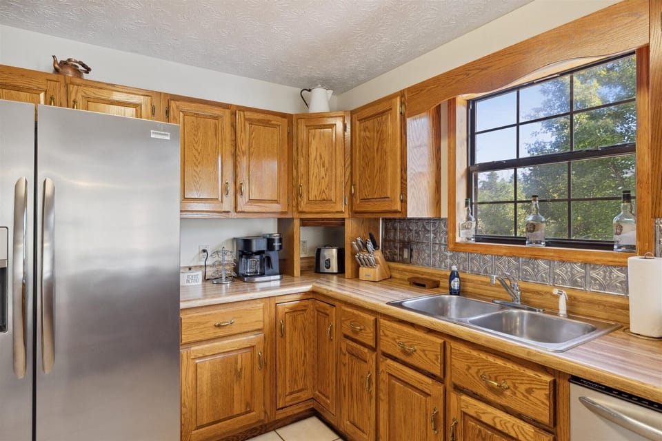 Whip up culinary delights in this bright, spacious kitchen with stunning views!