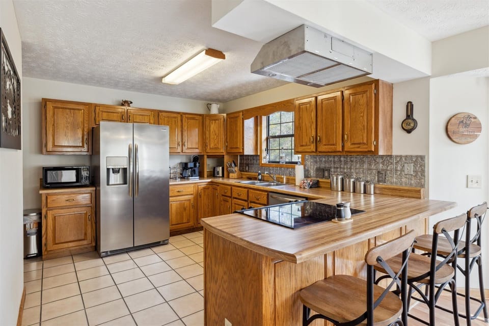 Whip up delicious meals in this sunny, spacious kitchen with modern amenities!