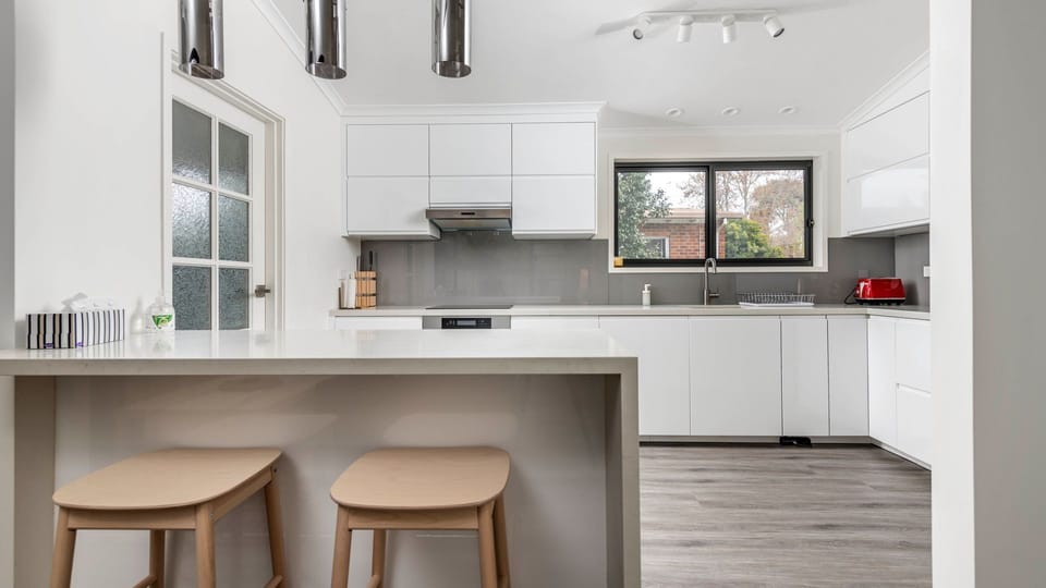 Bright and welcoming nook made for easy breakfasts and evening wine.