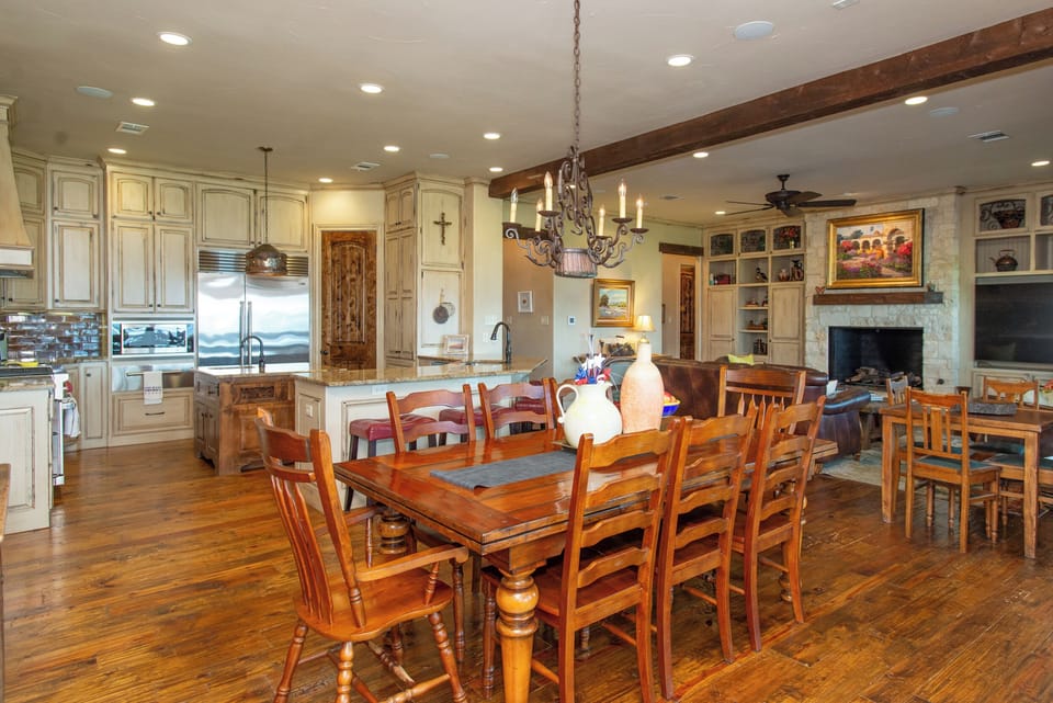 The dining room is open to the kitchen and living room, perfect for entertaining