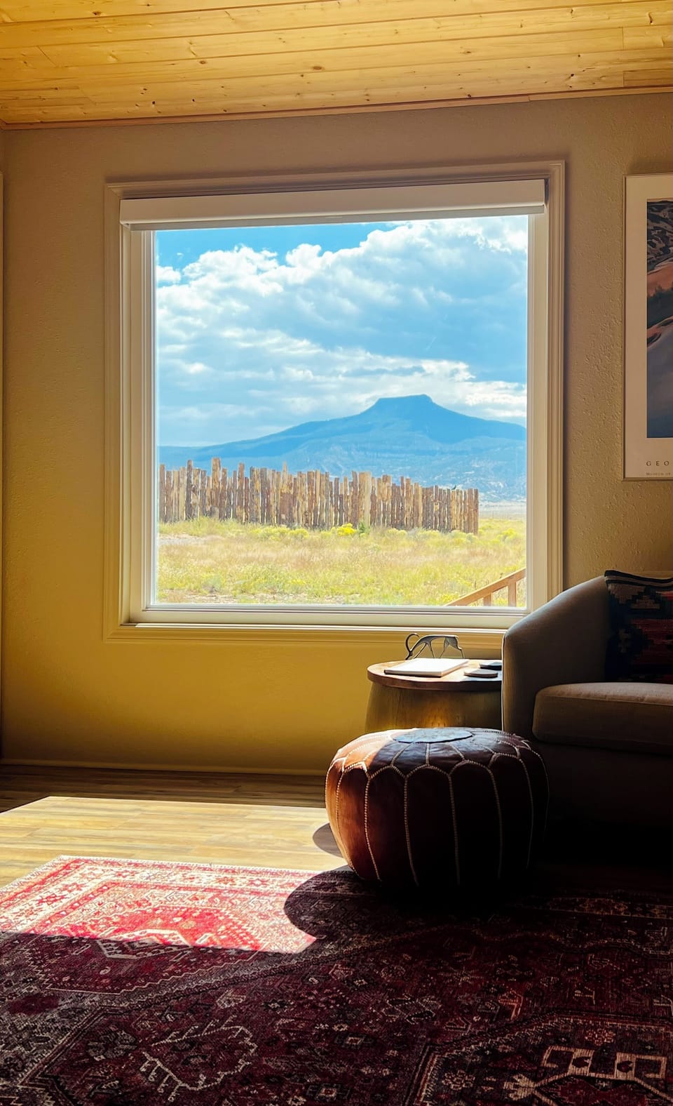 Picture window in living room looking directly at Cerro Pedernal