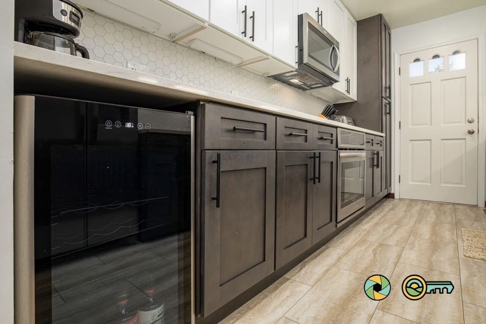 wine cooler this end, large pantry far end