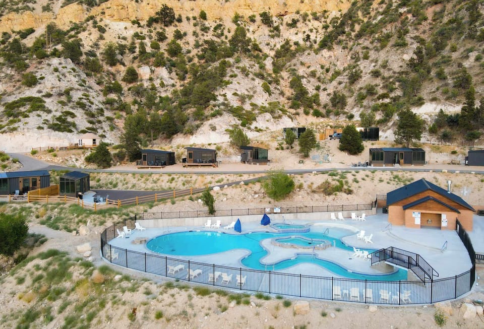 East Zion Resort’s lazy river, pool, two hot tubs, and nearby guest laundry — all part of your Southern Utah glamping stay.