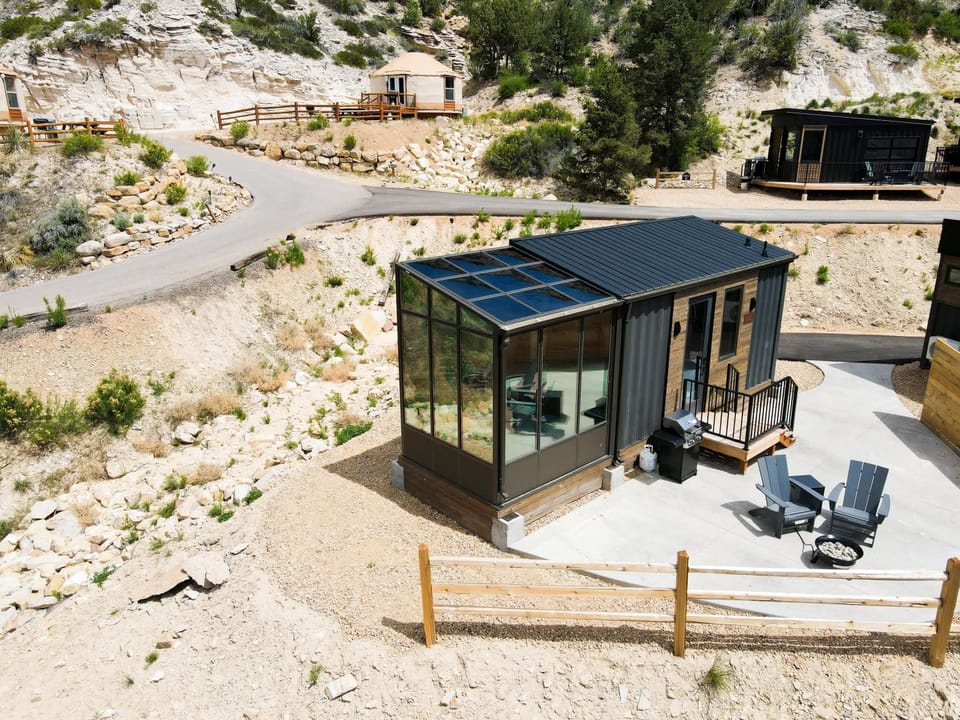 Enjoy blue sky and mountain views from the cabin’s living area and kitchen, creating a bright and peaceful space to relax during your Southern Utah stay.