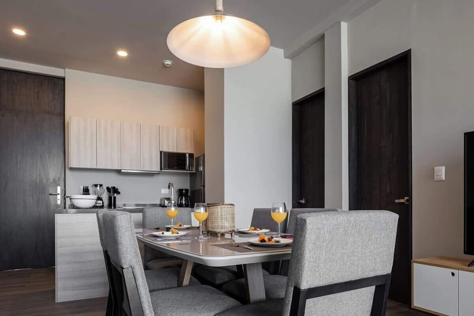 Elegant dining area for four, perfect for home meals.
