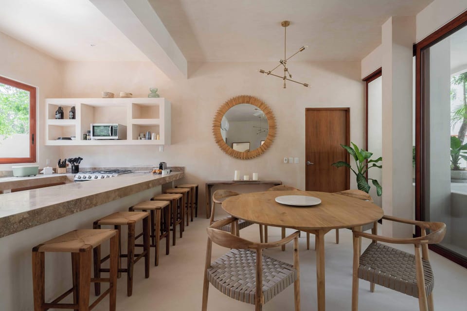 Bright interior space with large windows and comfortable seating.