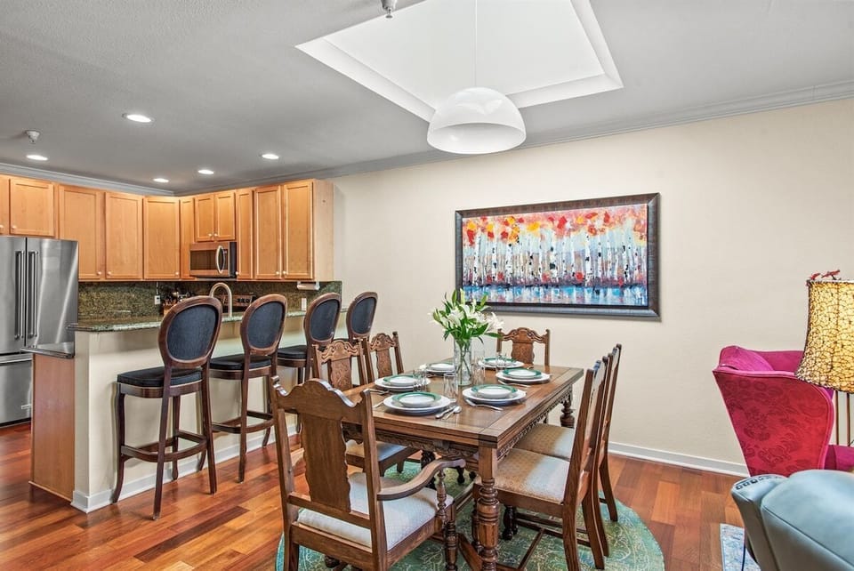 Open-concept living, dining, and kitchen area.