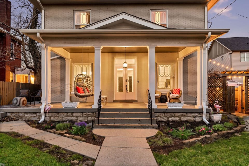 Unit 1: Stunning porch with outdoor seating.