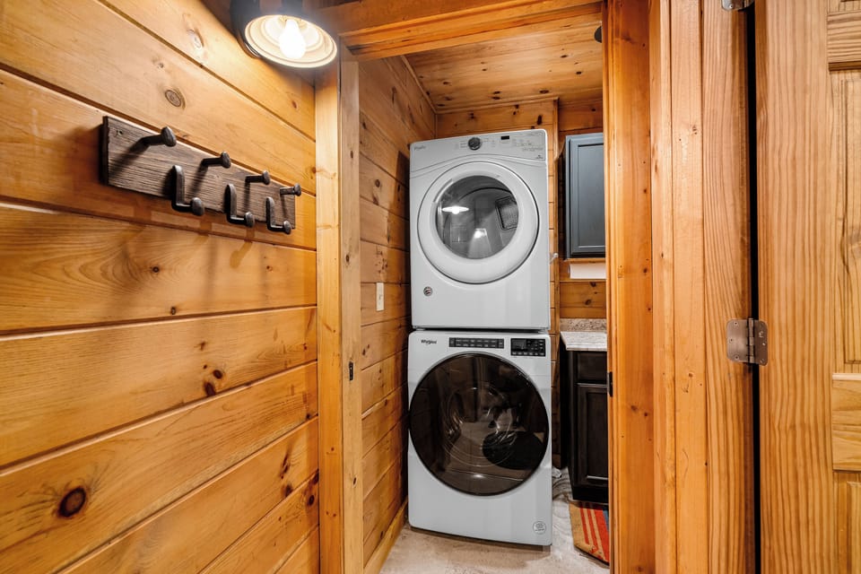 Lower level washing machie and dryer in large wash room