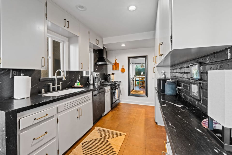 Kitchen is equipped with cooking basics and essentials