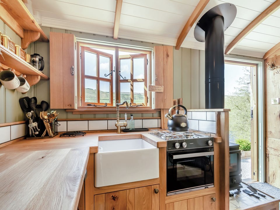 Kitchen/diner | Keepers Hide - Wuthering Huts, Oldfield, near Keighley