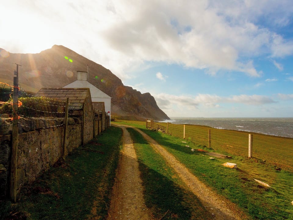 Setting | Blue, Red, Yellow - Coastal Path Cottages, Trefor