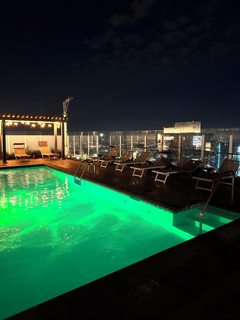 Rooftop swimming pool at night