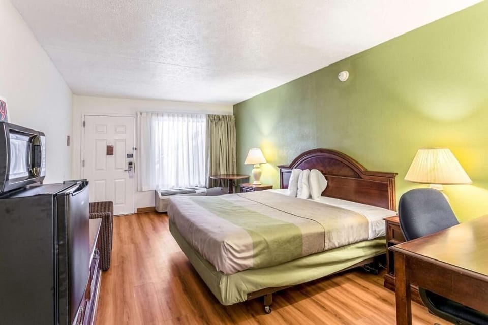 Drift off peacefully with bedside lamps and classic furnishings.