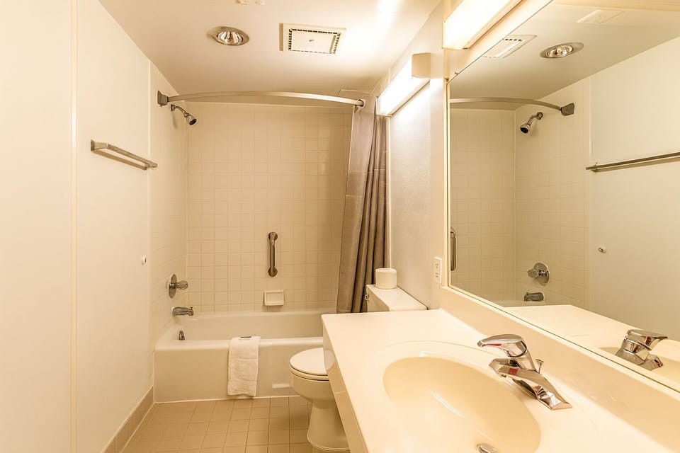 Freshen up in a clean, bright bath with tub-shower combo.