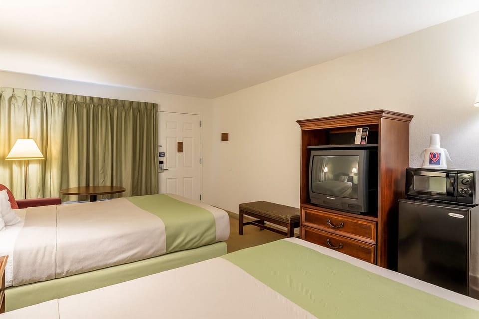 Settle in with convenient in-room storage and snack station.