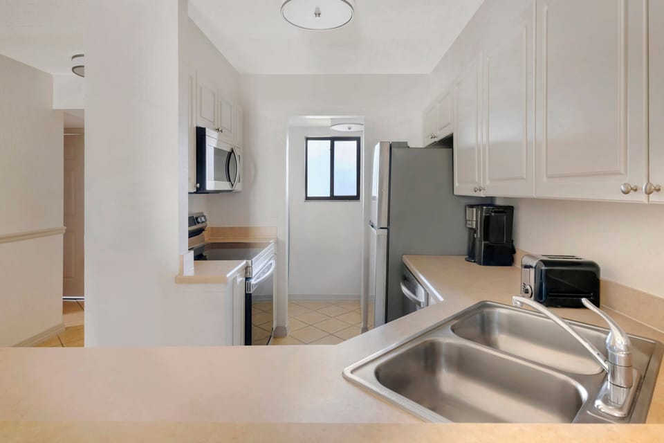 Cook together in the airy kitchen with generous counter space.
