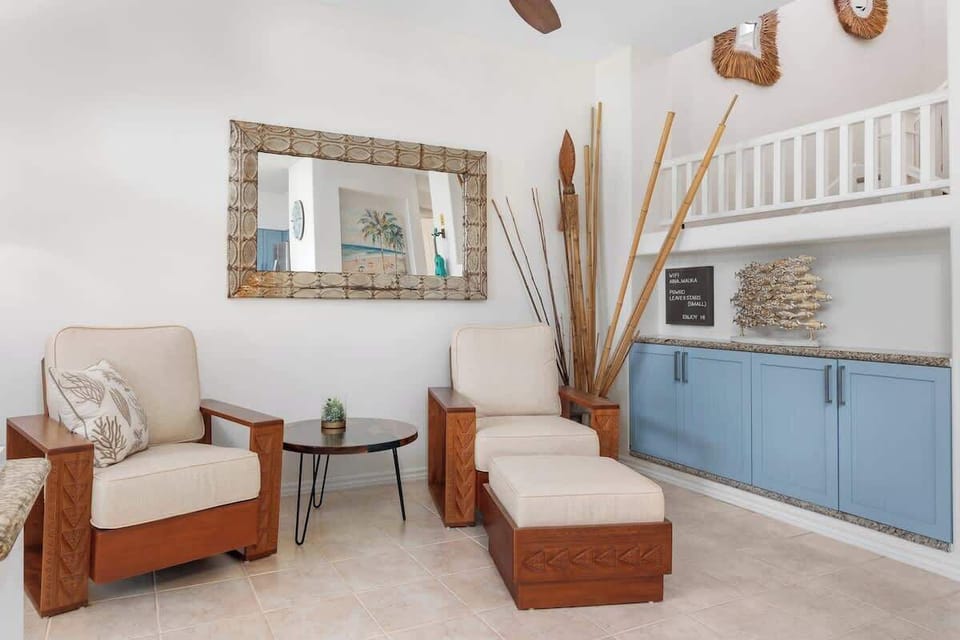 Discover cozy nooks and comfortable reading corners in this expansive living room, perfect for unwinding after a day of adventure.