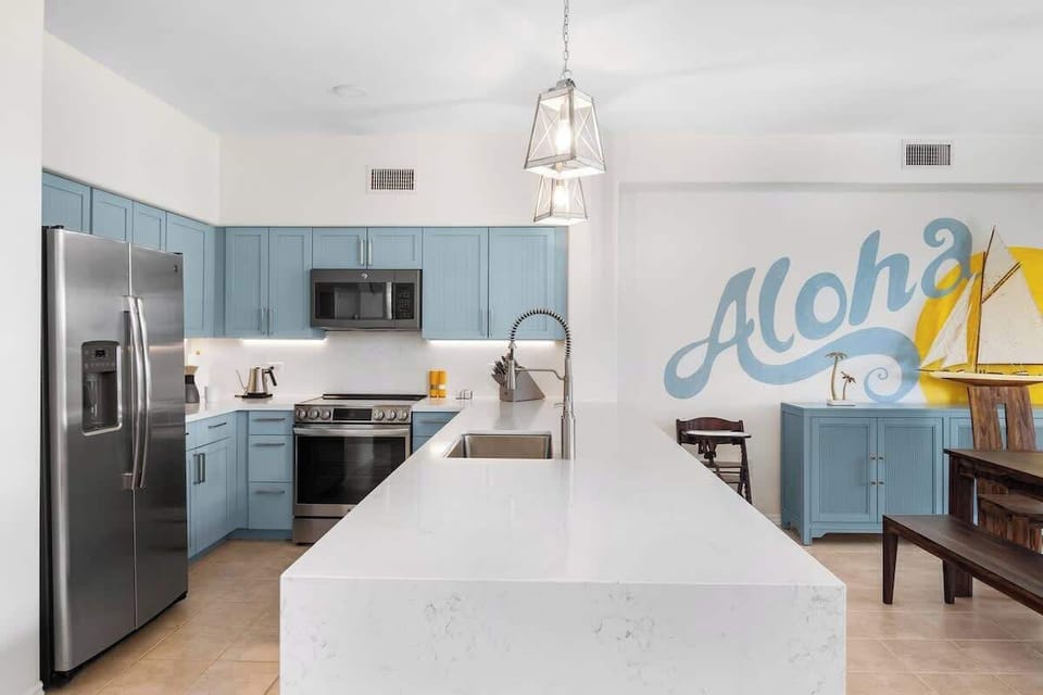 Cook up gourmet meals in the chef’s kitchen, complete with a coffee station featuring a top-notch coffee maker for your morning brew.