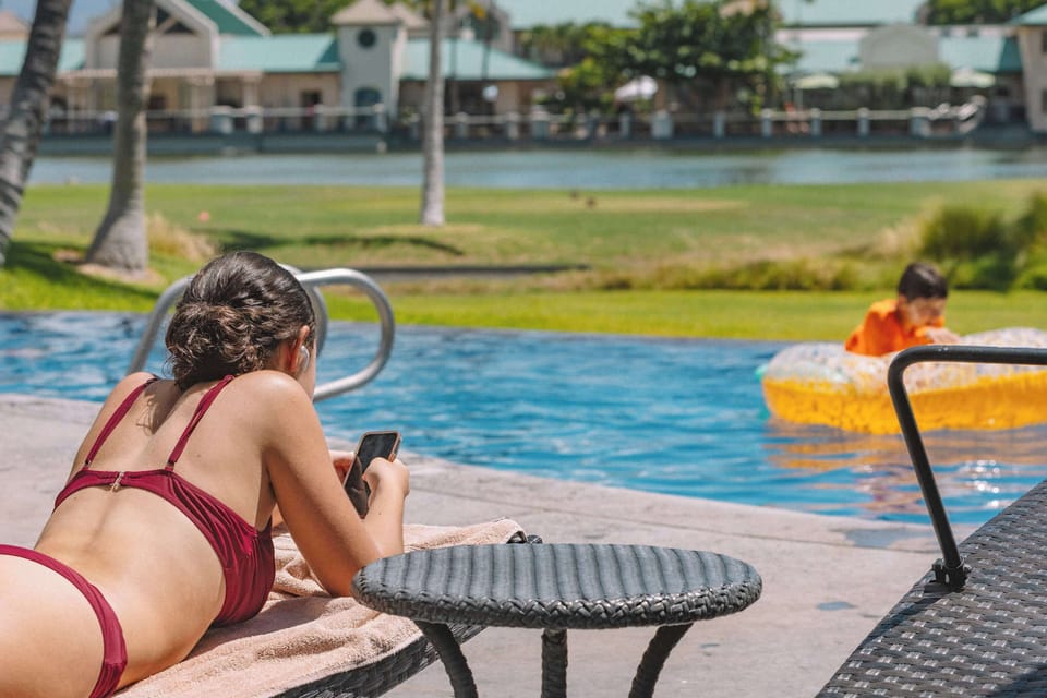 Relax in the amazing pool and hot tub, surrounded by tropical island vibes and stunning views, creating a perfect oasis for leisure.