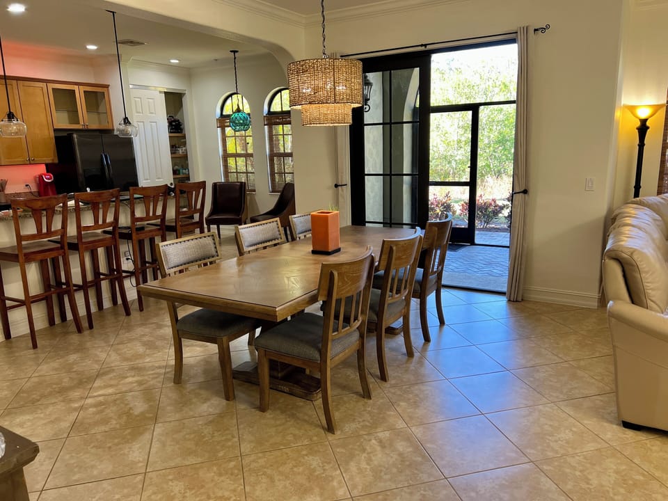 Dining View to Kitchen and Eat-in-Nook. Pantry Closet and Laundry Off Kitchen.