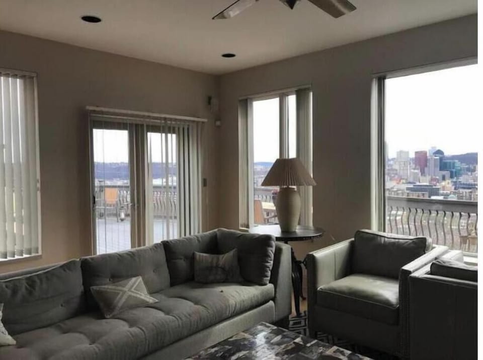 Living room with deck access and views