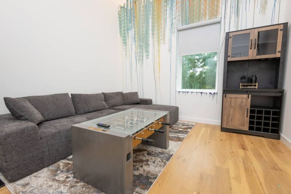 Living Room: Stylish furnishings and vibrant decor invite relaxation and fun gatherings!