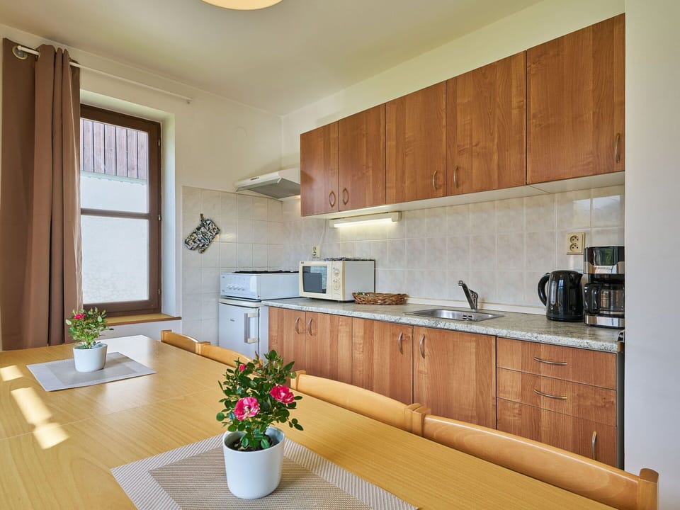 Flooring, Countertop, Kitchen, Floor, Interior Design, Wood, Furniture, Ceiling, Cabinetry, Kitchen Appliance