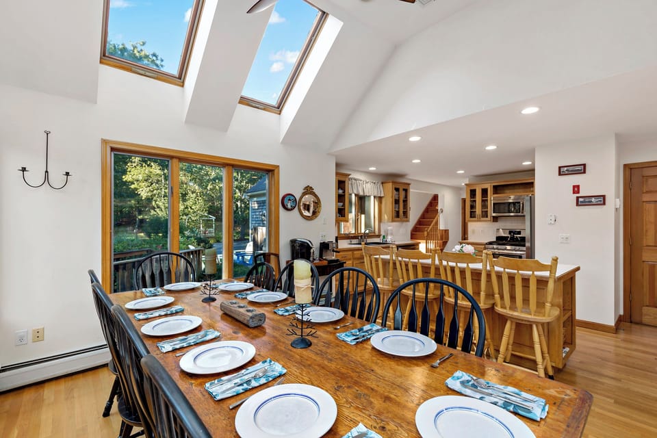 Vaulted ceilings and skylights make this bright and welcoming space.