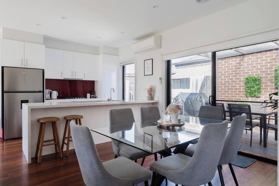  Come together for a meal around the dining table or take things slow up at the breakfast bar.
