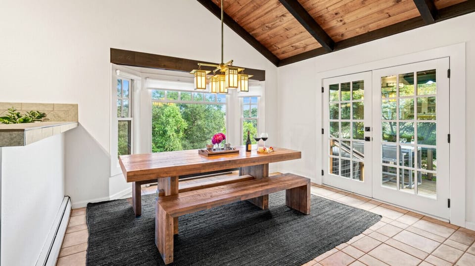 Stunning dining area with extensive natural lighting provided by the rooms bay window.
